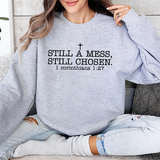 Christian Crewneck Sweatshirt — "Still a Mess, Still Chosen" (1 Corinthians 1:27)